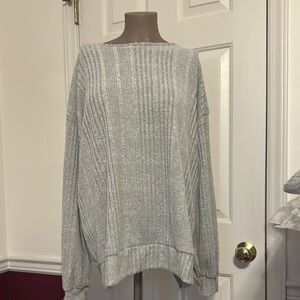 Gray Crew Neck Sweater with Asymmetrical Hem and Ribbed Texture